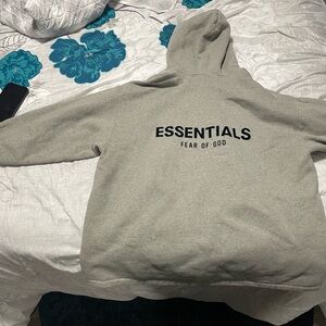 Fear of God ESSENTIALS Hoodie in Light Gray with Black Logo